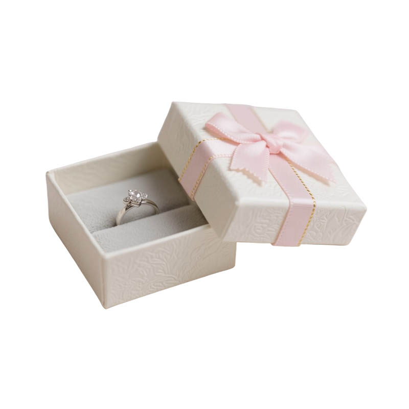 How does the telescopic box solve the packaging challenge for products of varying heights?